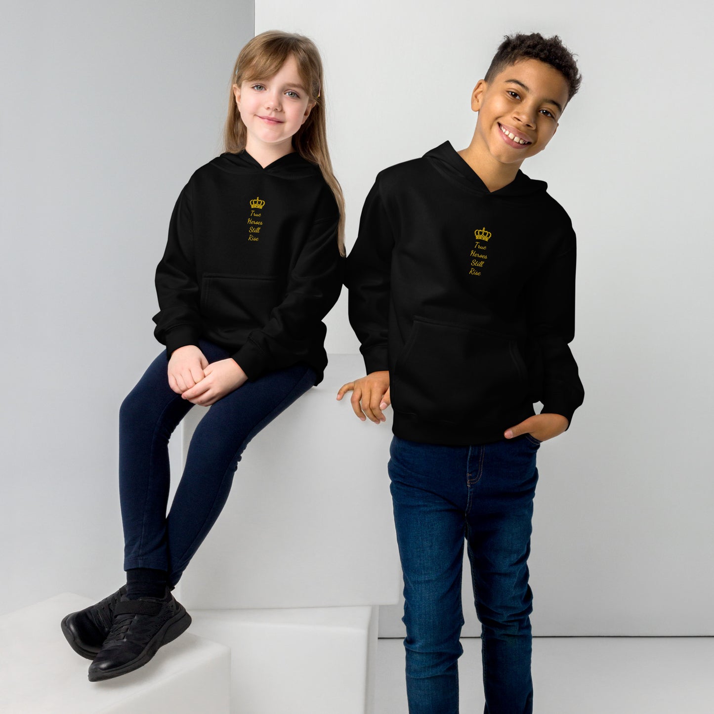 THSR Youth Pullover Hoodies with Center-Chest Logo – Black or White Pullover Hoodies Featuring Gold "True Heroes Still Rise" under a crown Design for Kids