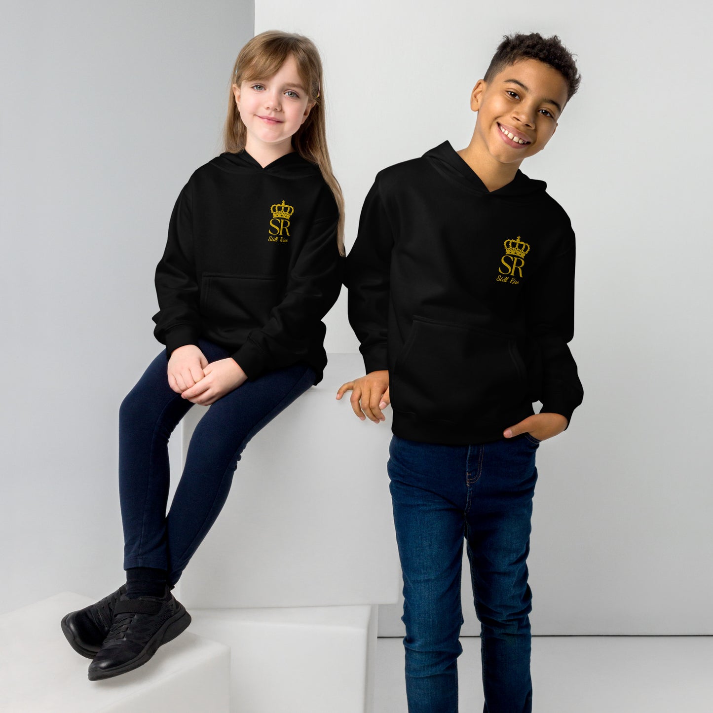 THSR Youth Pullover Hoodies with Left-Chest Logo – Black or White Pullover Hoodies Featuring Gold THSR "SR Still Rise" under a crown Design for Kids