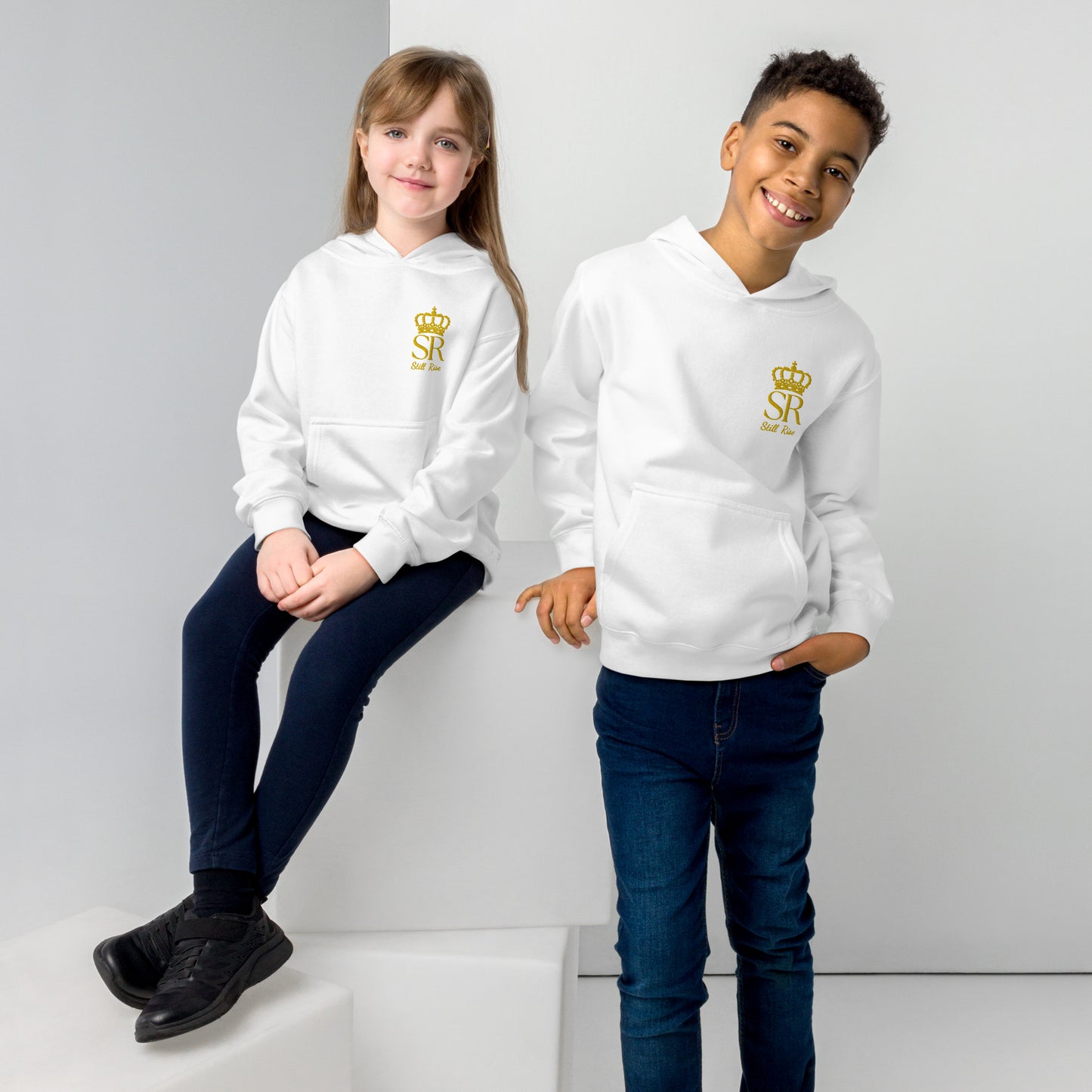 THSR Youth Pullover Hoodies with Left-Chest Logo – Black or White Pullover Hoodies Featuring Gold THSR "SR Still Rise" under a crown Design for Kids