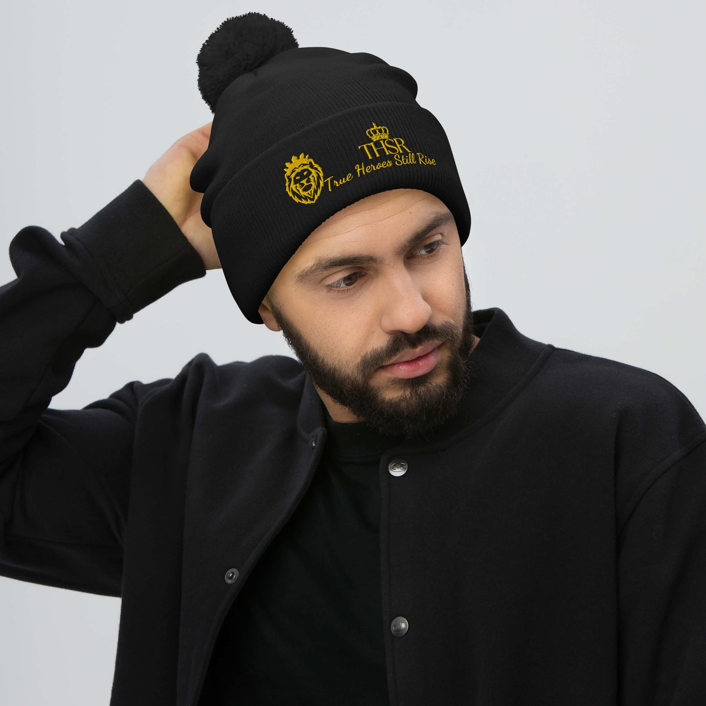 THSR Black Pom-Pom Beanie with Gold Embroidered THSR KING Lion & Crowned THSR True Heroes Still Rise Logo – Warm, Stylish Winter Hat