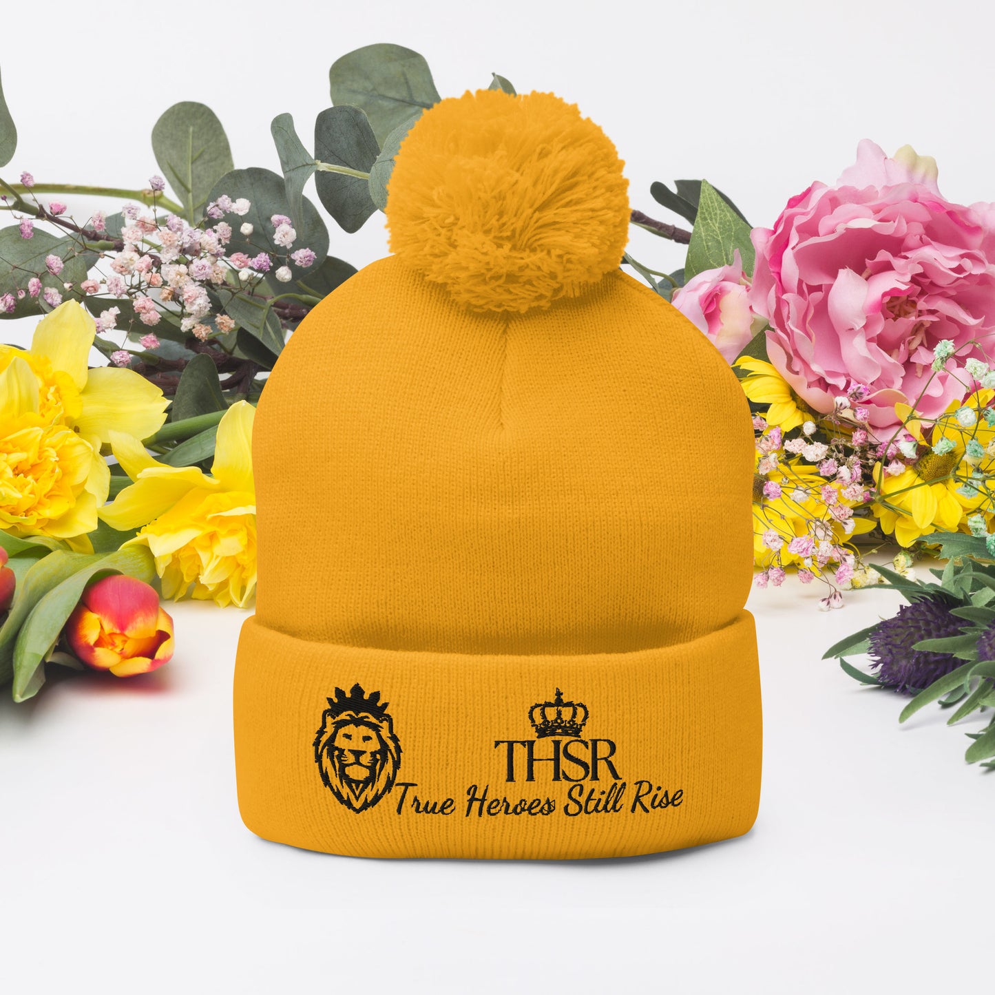 THSR Gold Pom-Pom Beanie with Black Embroidered THSR KING Lion & Crowned THSR True Heroes Still Rise Logo – Warm, Stylish Winter Hat