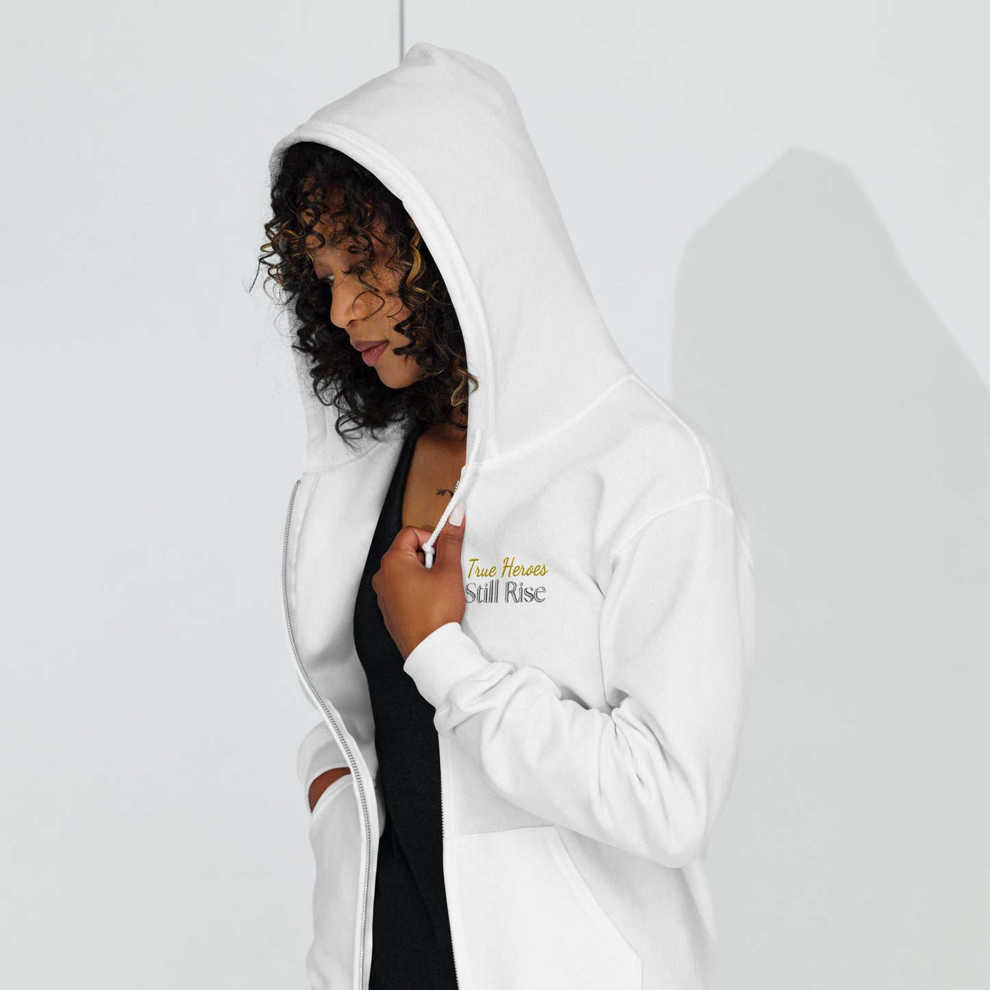 THSR Unisex White Zip-up Hoodies - Embroidered Bold Gold and Black "True Heroes Still Rise" Design