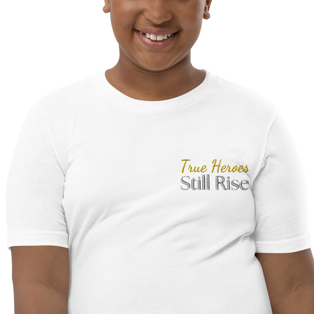 THSR Youth T-Shirt with Left-Chest Logo – White T-shirt Featuring Bold Gold and Black "True Heroes Still Rise" Design for Kids